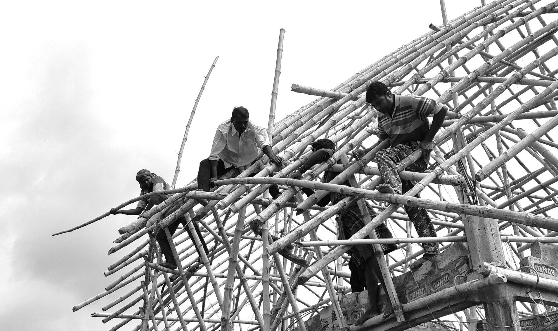 Artisans and Designers Collaborating on Architecture Site